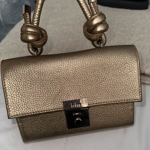 Gold Behno Top Handle Mini Bag